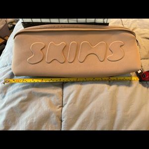 SKIMS neoprene zippered pouch